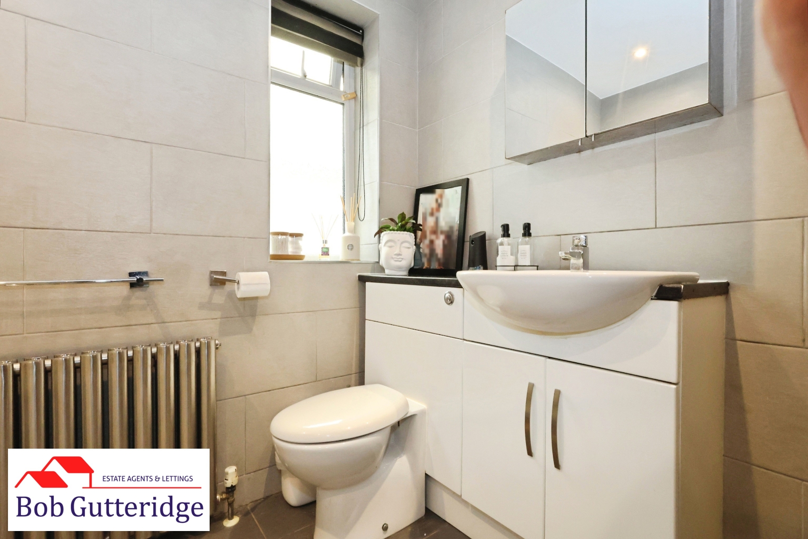 FULLY TILED BATHROOM